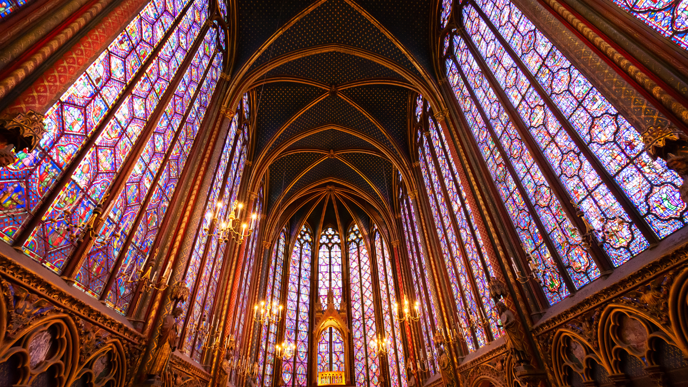Inside of the Sainte-Chapelle church colorful stained glass in Paris.