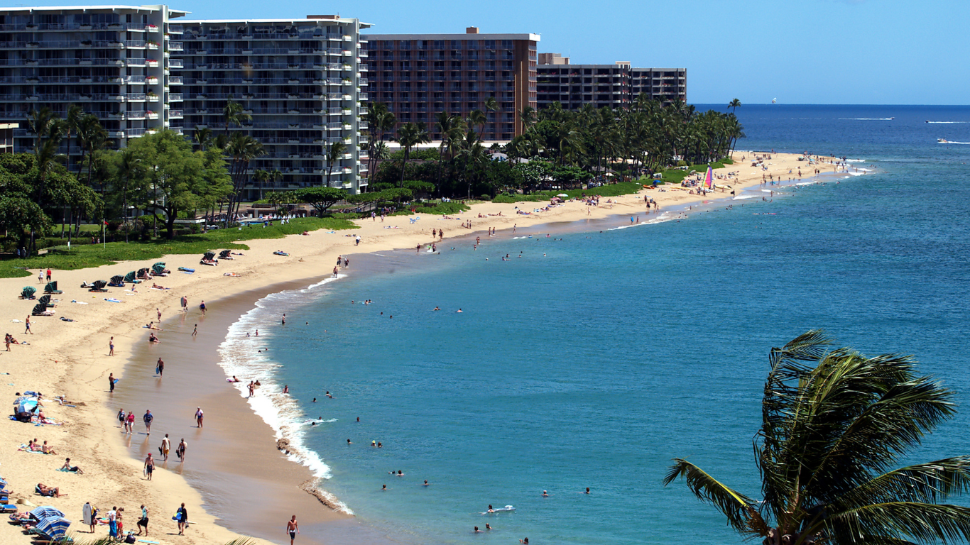 People enjoying beach resorts in West Maui, Hawaii