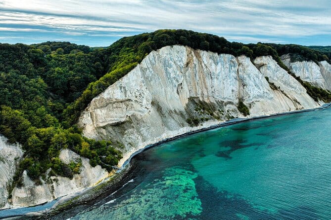 Møns Klint in Denmark has dramatic cliffs and beautiful clear ocean waters. 