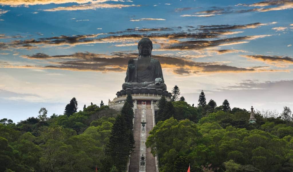 A tall staircase leading up to a statue of Buddha at Lantau Island.