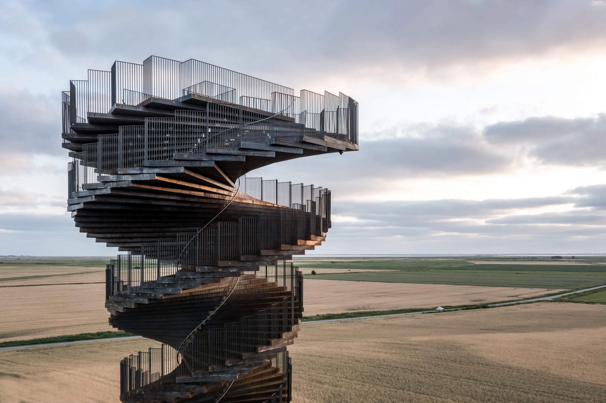 A large tower with a spiral stair case to get to the top that is for viewing the landscape at Wadden Sea National Park