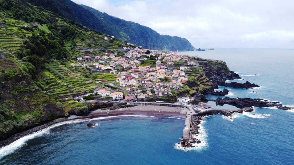 ariel view of Praia do Porto do Seixal beach in Portugal.