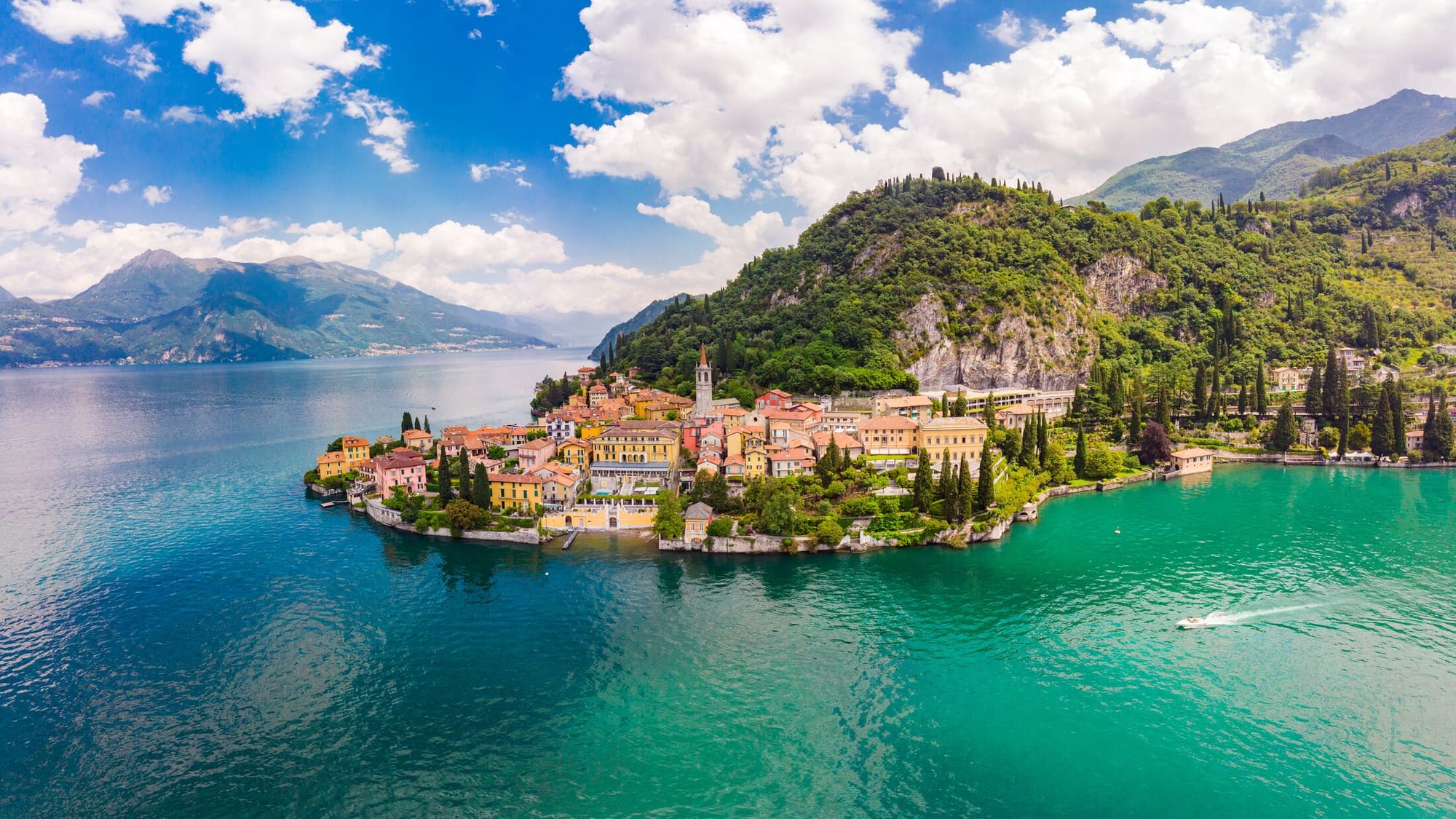 Colorful lakeside village nestled on the serene blue shores of Lake Como in northern Italy.