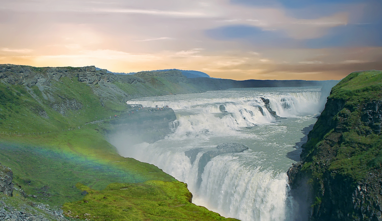 A rainbow caused by the mist of Gullfoss Waterfall in Iceland.
