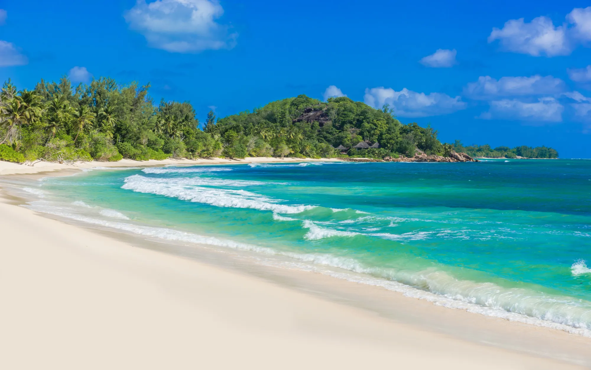 Beautiful views of the crystal clear waters of Grand Anse, La Digue in Seychelles.
