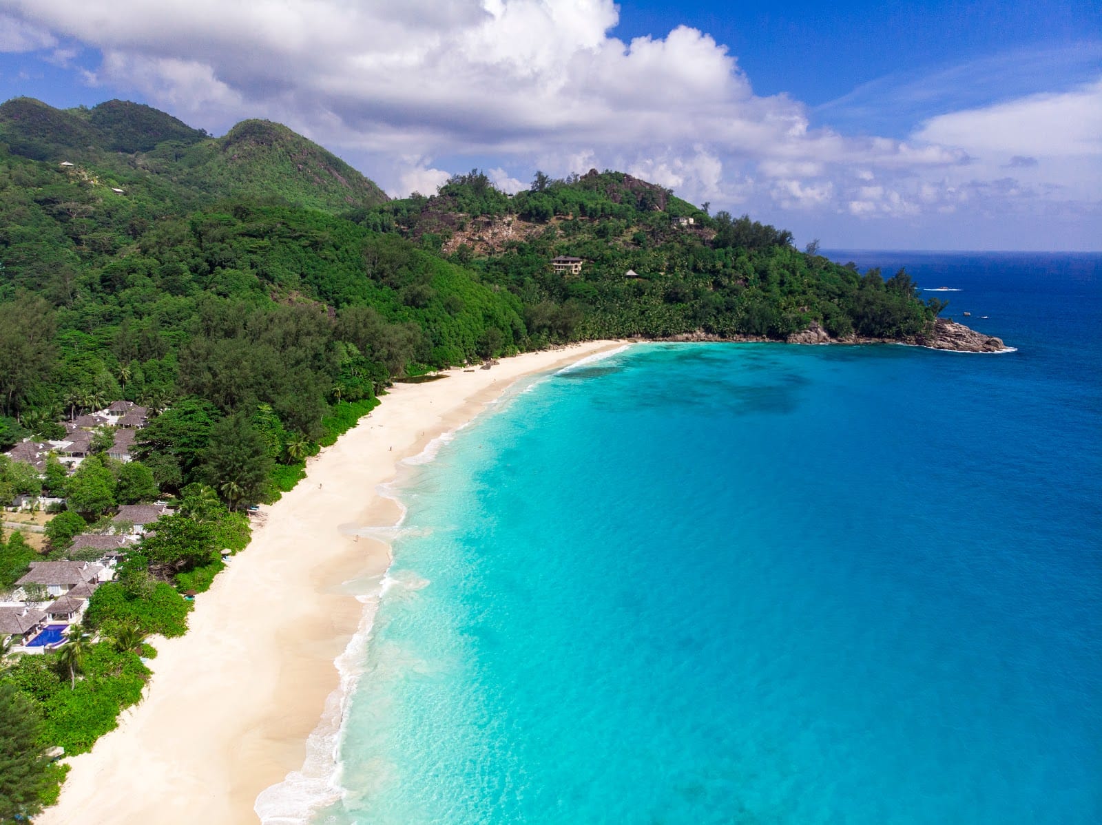 Ariel view of a long beautiful beach named Anse Intendance, Mahé