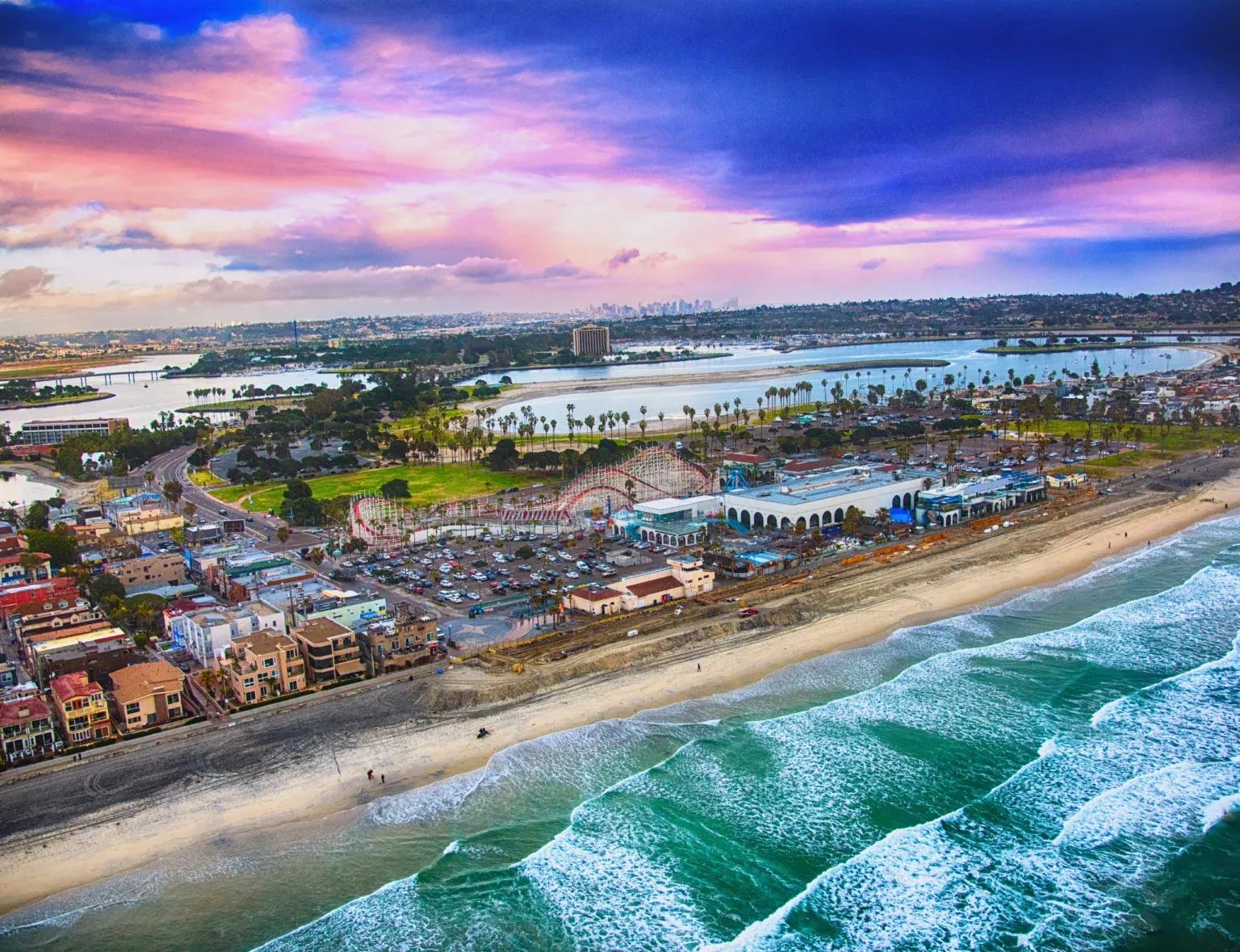 Mission Beach in San Diego with a roller coaster in the background.