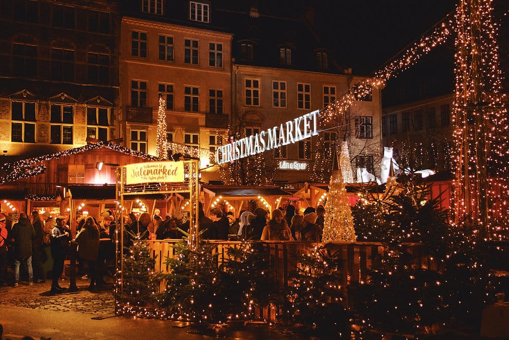 Christmas markets at night in Copenhagen Denmark.