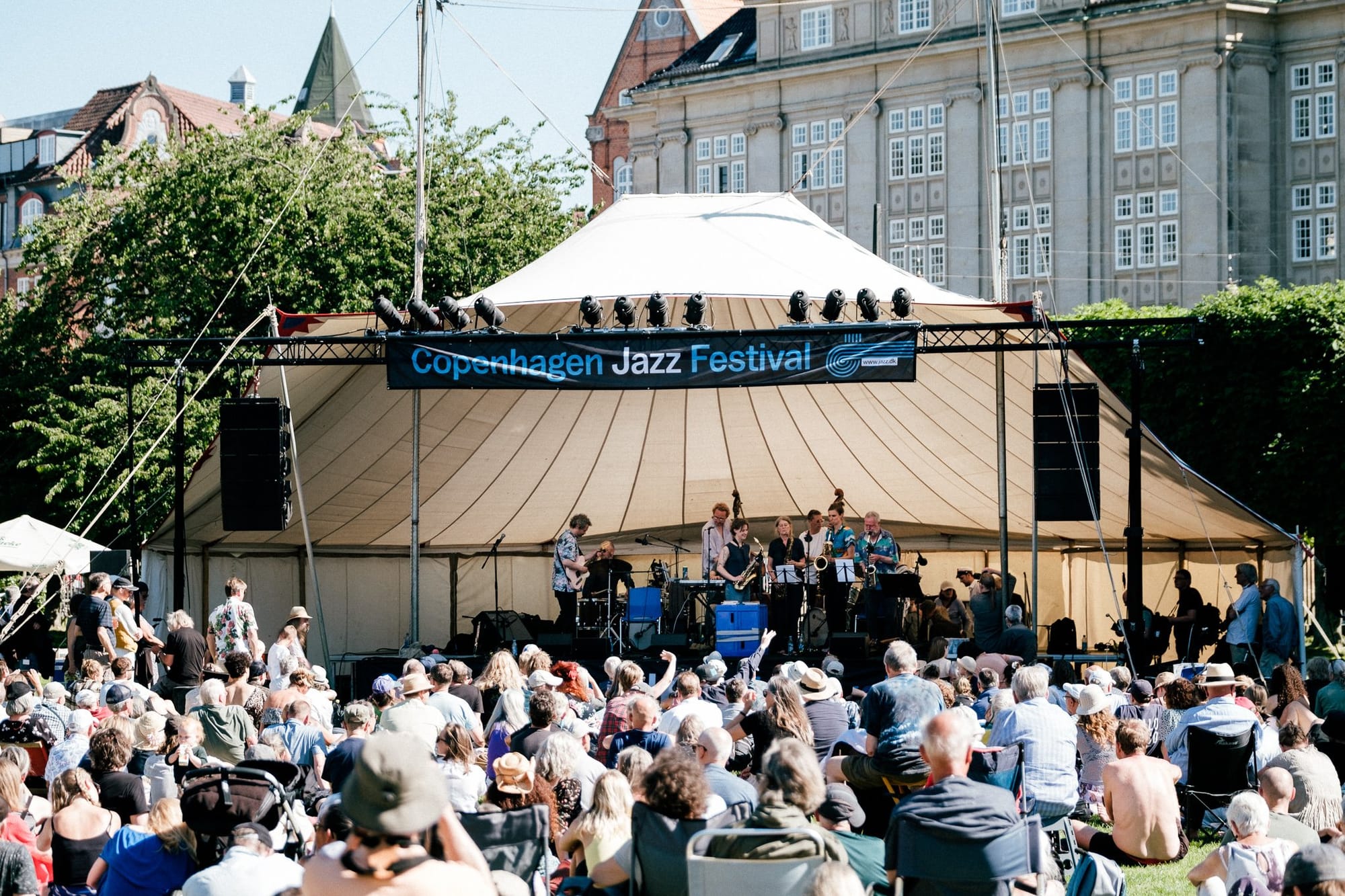 crowd of people listening to a band at the Copenhagen Jazz Festival.