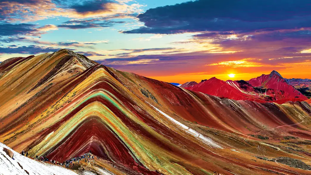 Very colorful mountain near Cuzco called Vinicunca (Mountain of Seven Colors), that has many different colors just like a rainbow, and doesn't even look real.
