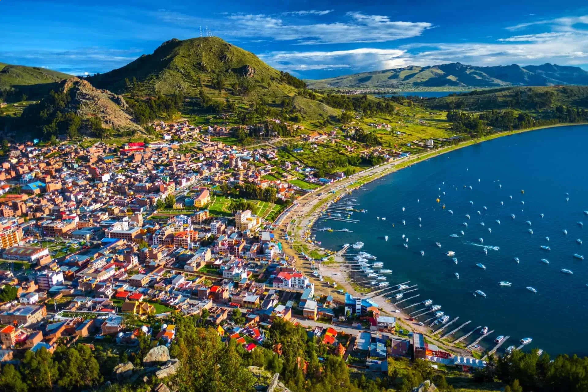 Ariel view of a lake in Bolivia with lots of boats anchored!