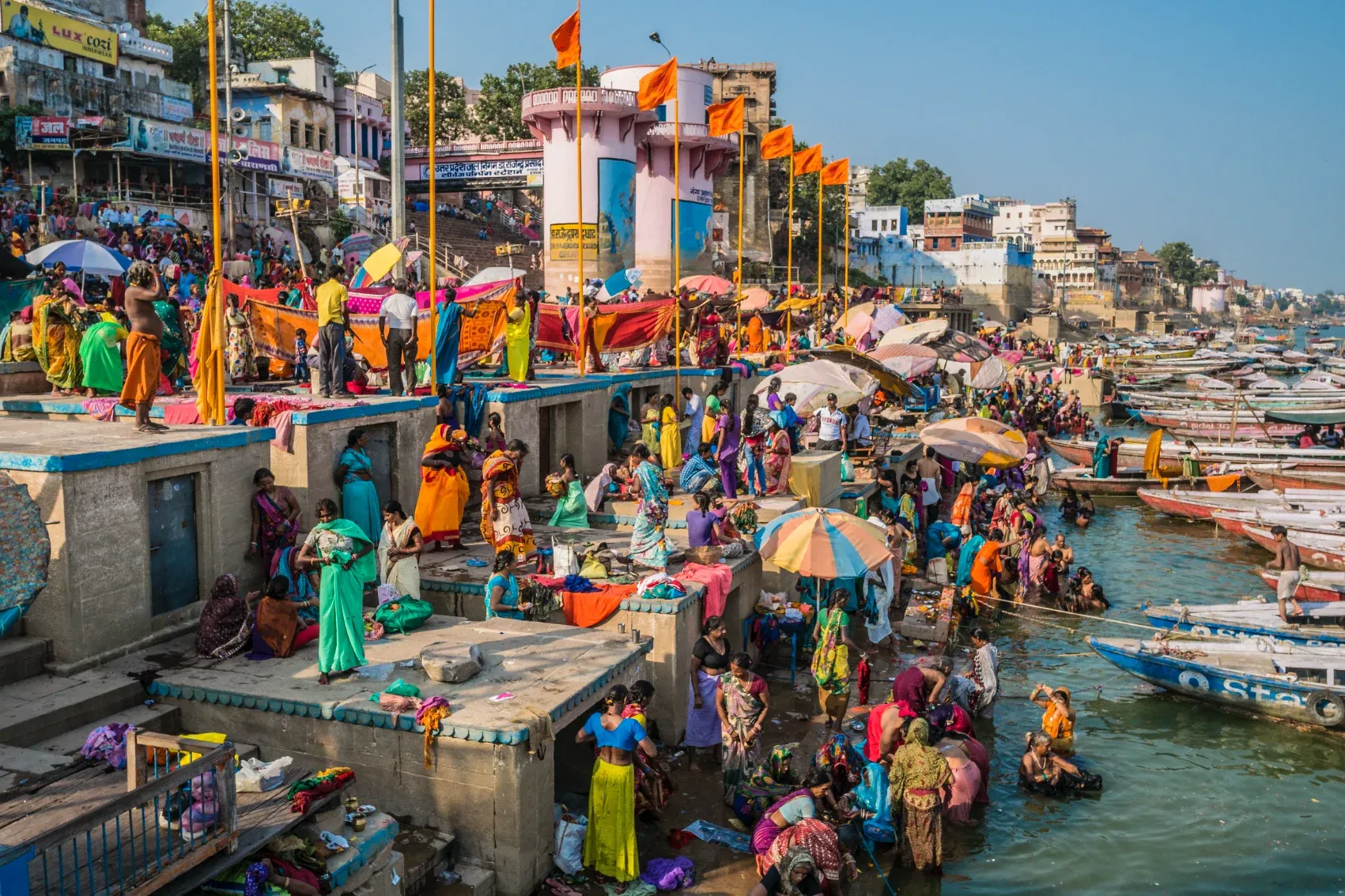 People worshiping near the river in Varanasi India