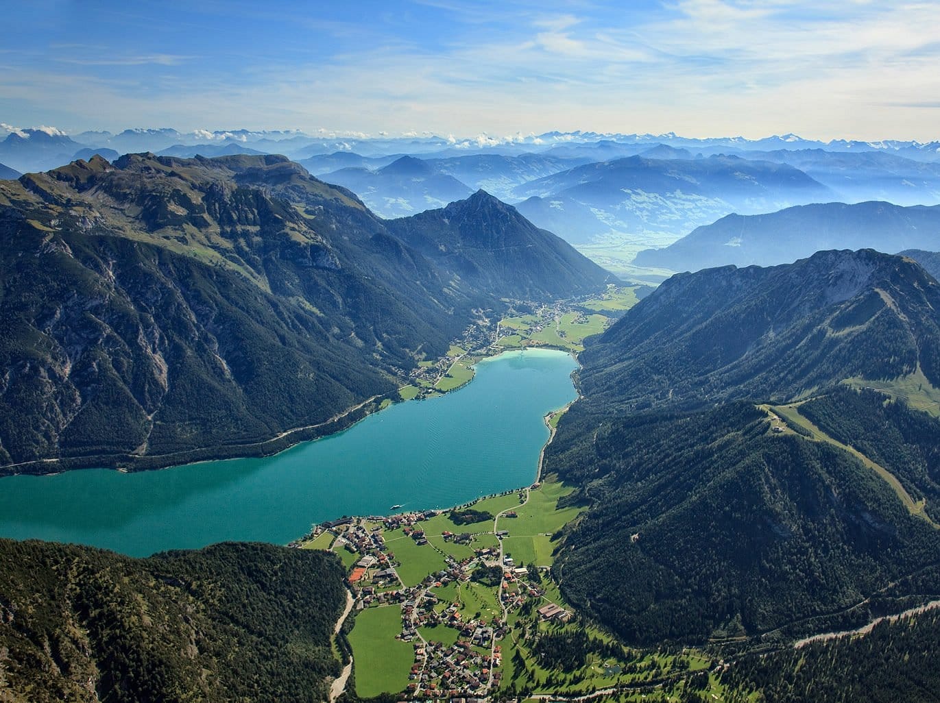 Ariel view of a village next to a fjord in Austria. 