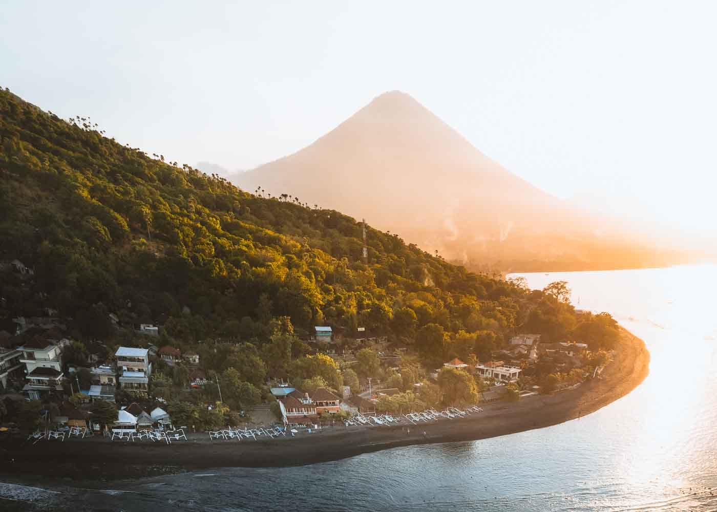 The Coastal village Amed Bali with misty mountains