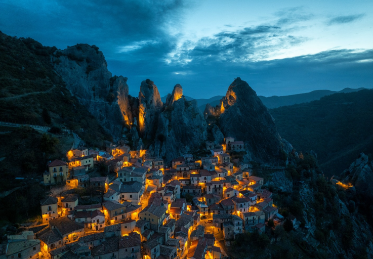 Village lights at night in Castelmezzano, Italy.