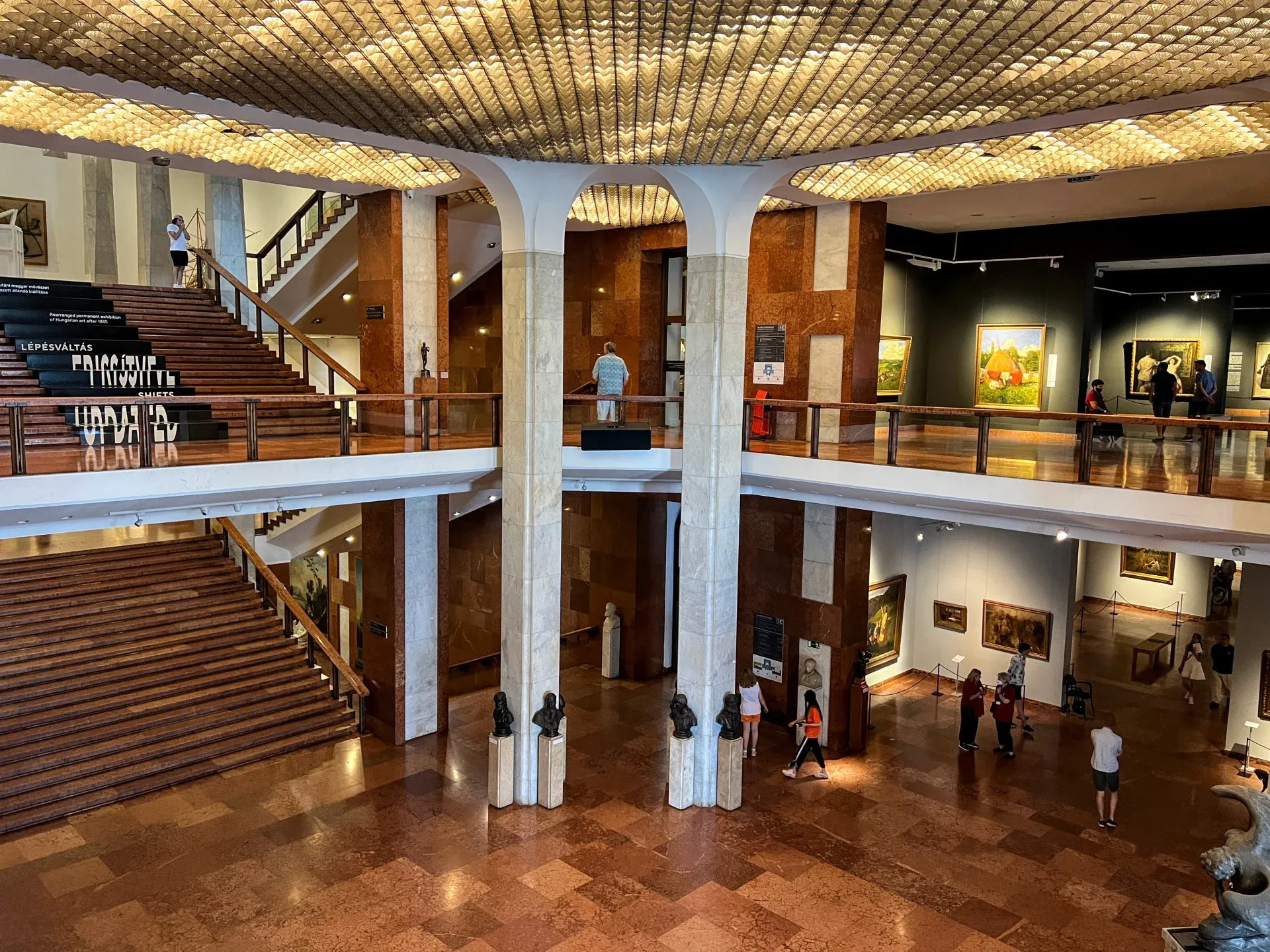 People walking around and exploring the Hungarian National Gallery