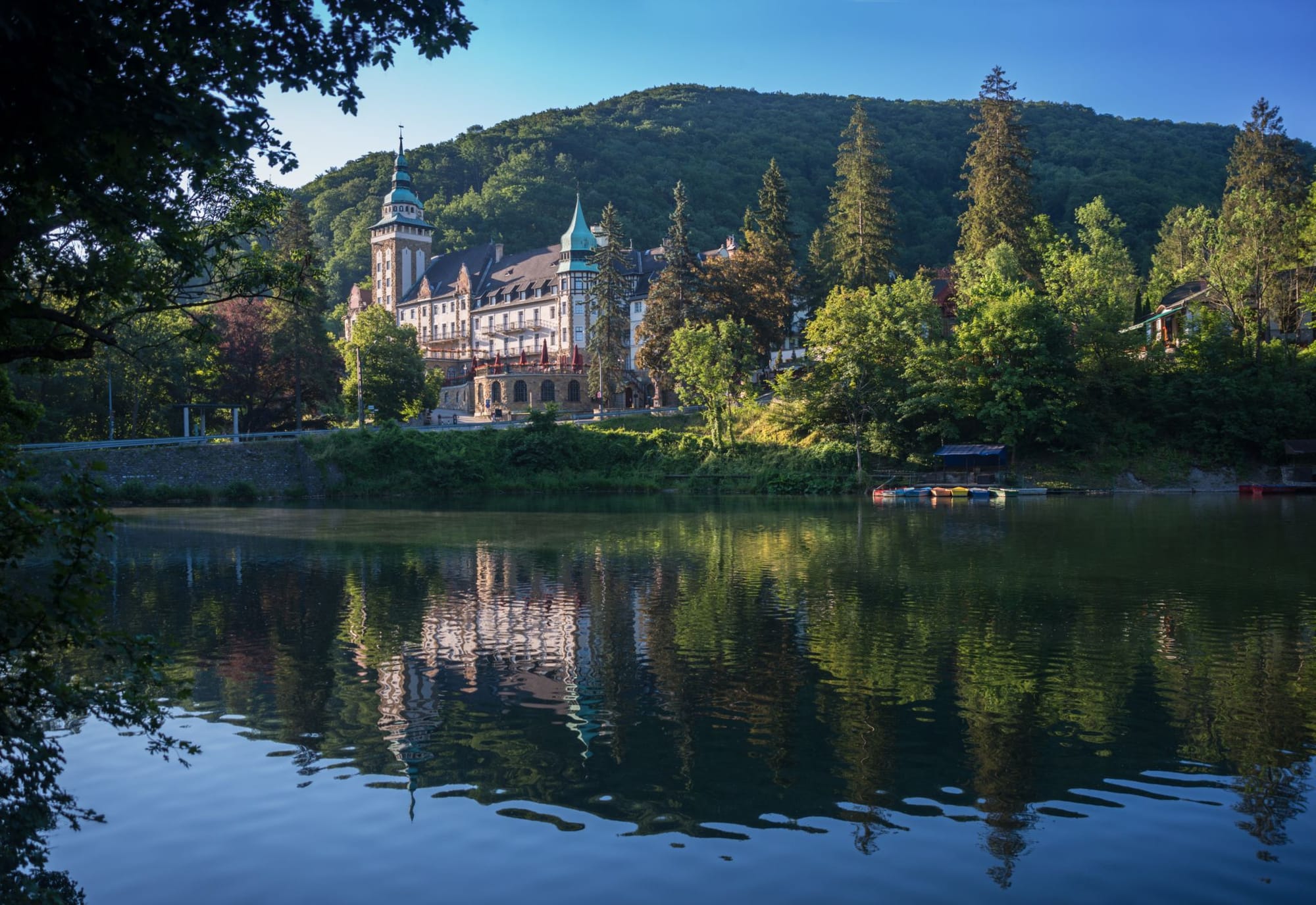 Lake Hámori in Hungary with a building reflecting off the water.