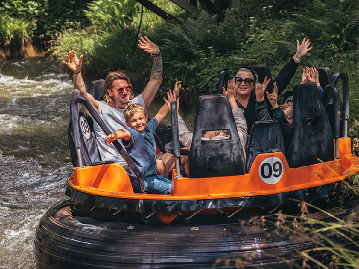 People riding a water ride river ride at BonBon-Land amusment park.