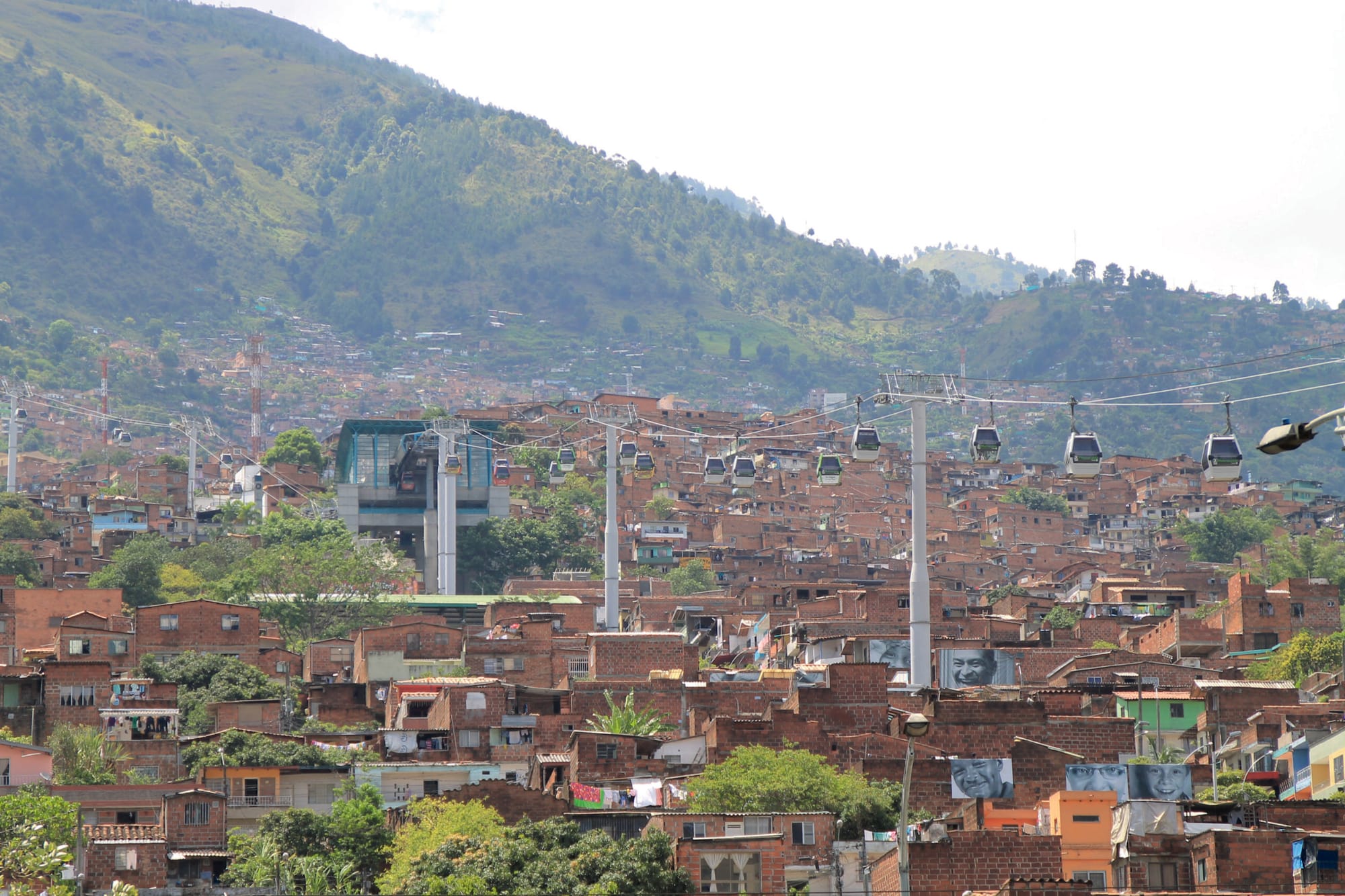 Zoomed out view of the Cable car going over Medellin, Colombia.