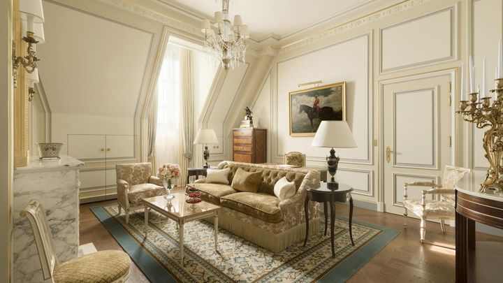 Inside of a elegant fancy hotel room in Paris, France. 
