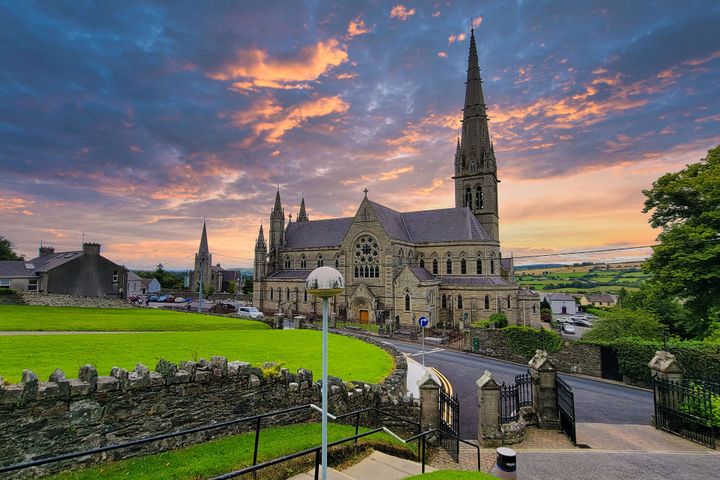 Dublin Cathedral at sunset with cloudy skies. 