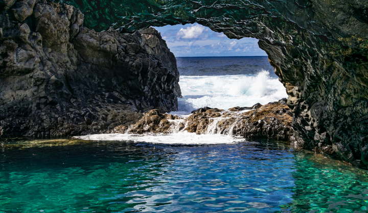 Charco Azul, El Hierro, Canary Islands - A beautiful oceanfront cave that has clear waters.