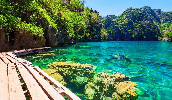 Crystal clear waters at Kayangan Lake in Coron Island, Palawan Philippines