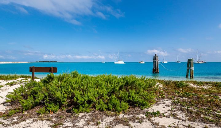 Sailboats anchored near the shore in Key West, Florida. 