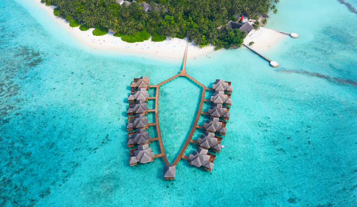A resorts over the water ocean villas in the Maldives, where the water is crystal clear and beautiful. 