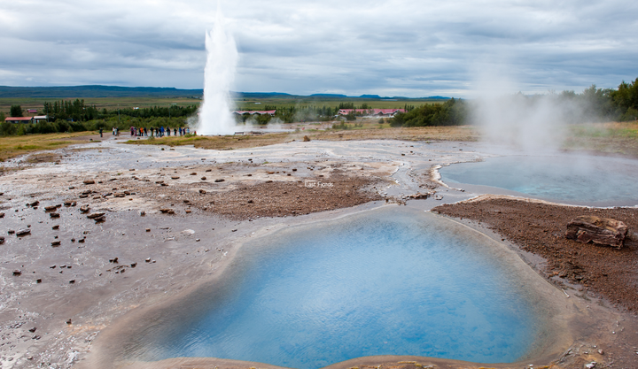 Strokkur geysir eruption on Iceland's Golden Circle route.