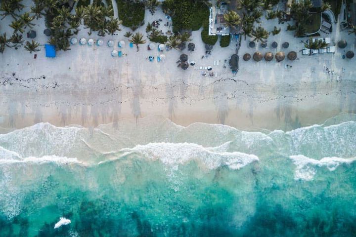 Ariel view washing into the beach in Tulum. 