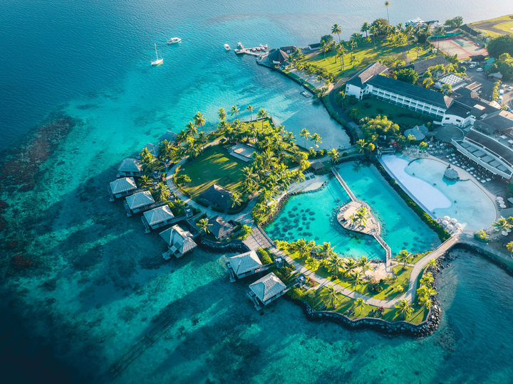 Ariel view of an over water bungalow in Tahiti.