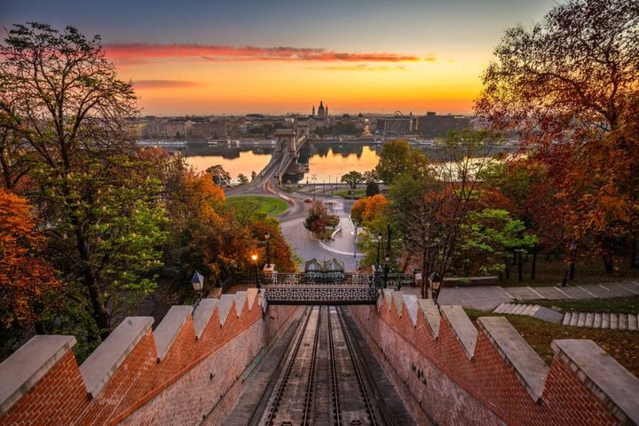 A view from the top of stairs looking across the river towards Buda Castle in Budapest.