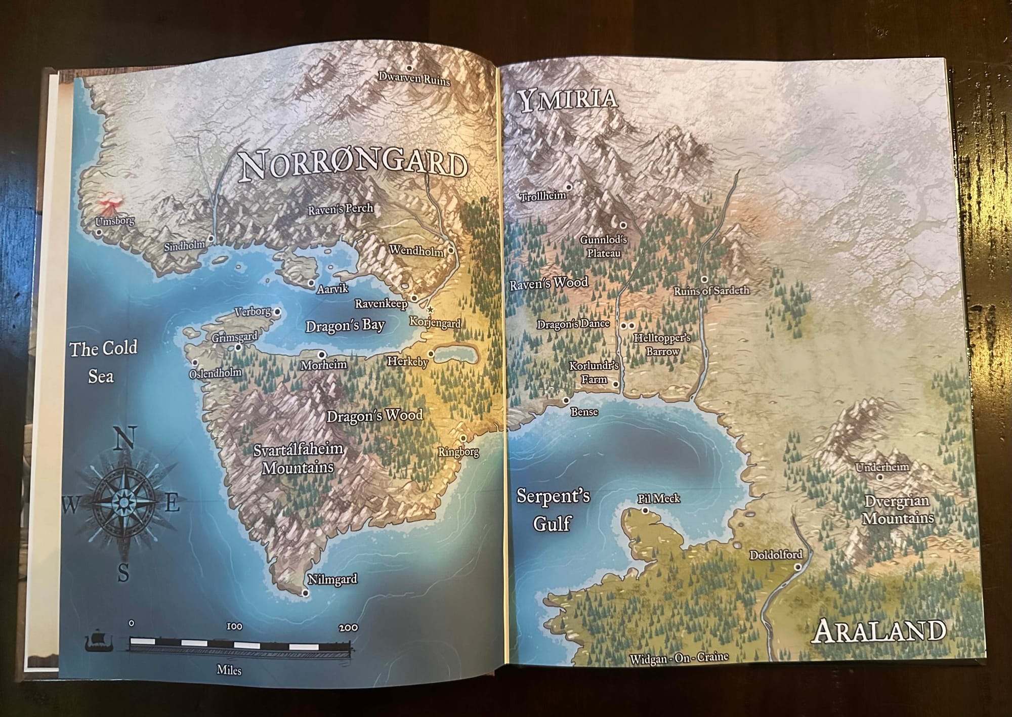 A two page spread of a map of the land