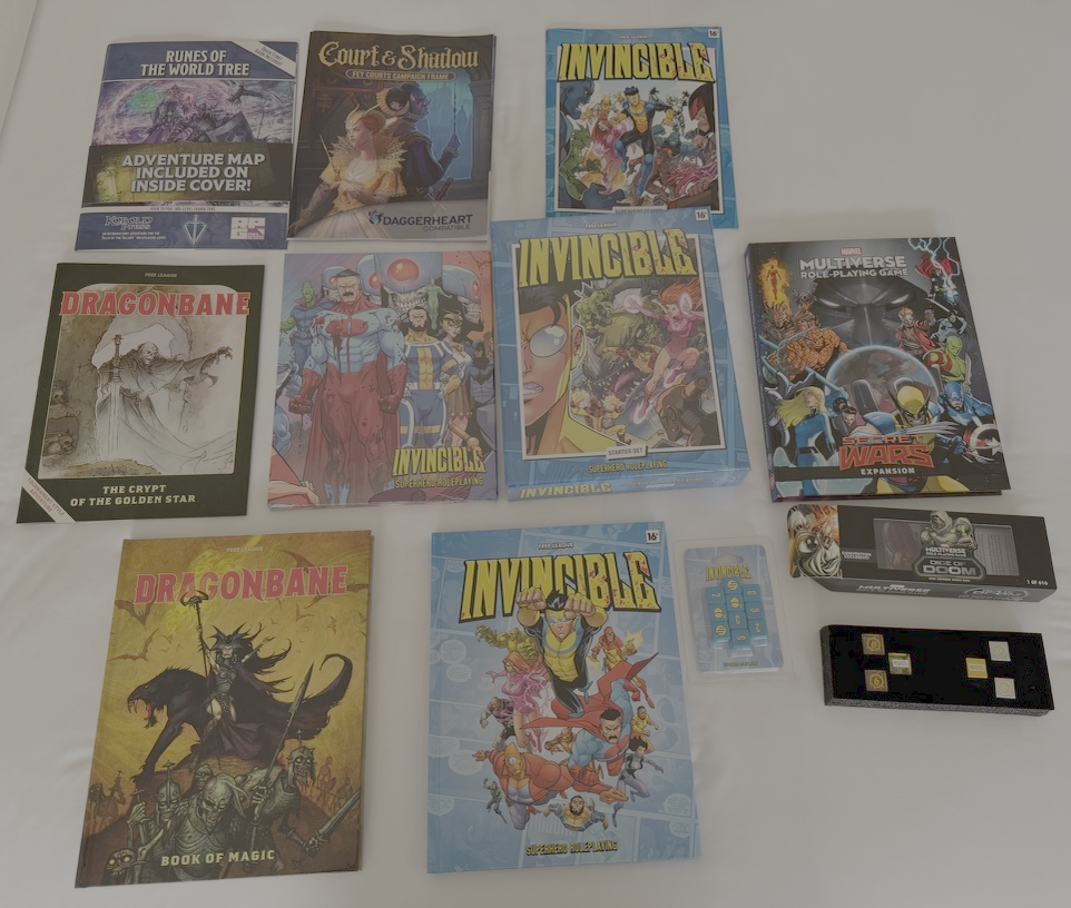 A bunch of games - Invincible core, Invincible starter, Invincible adventure, Invincible dice, Marvel Secret Wars, Marvel Dice of Doom, Dragonbane Book of Magic, Dragonbane The Crypt of the Golden Star, TOV Runes of the World Tree, Daggerheart Courts & Shadow