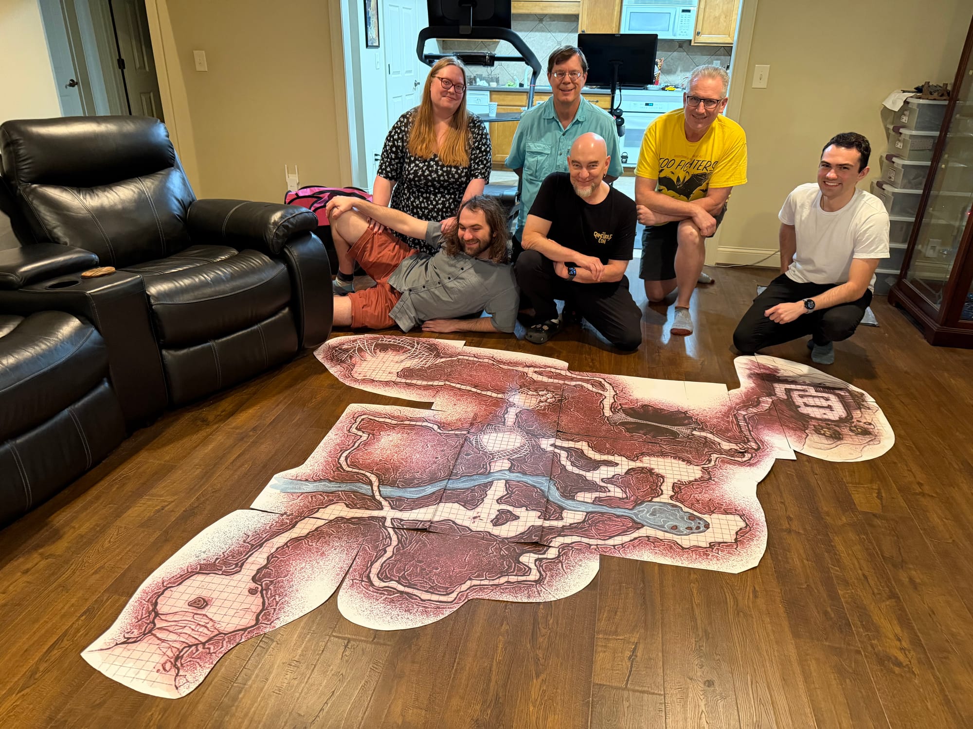 Six folks behind a giant cavern complex on the floor