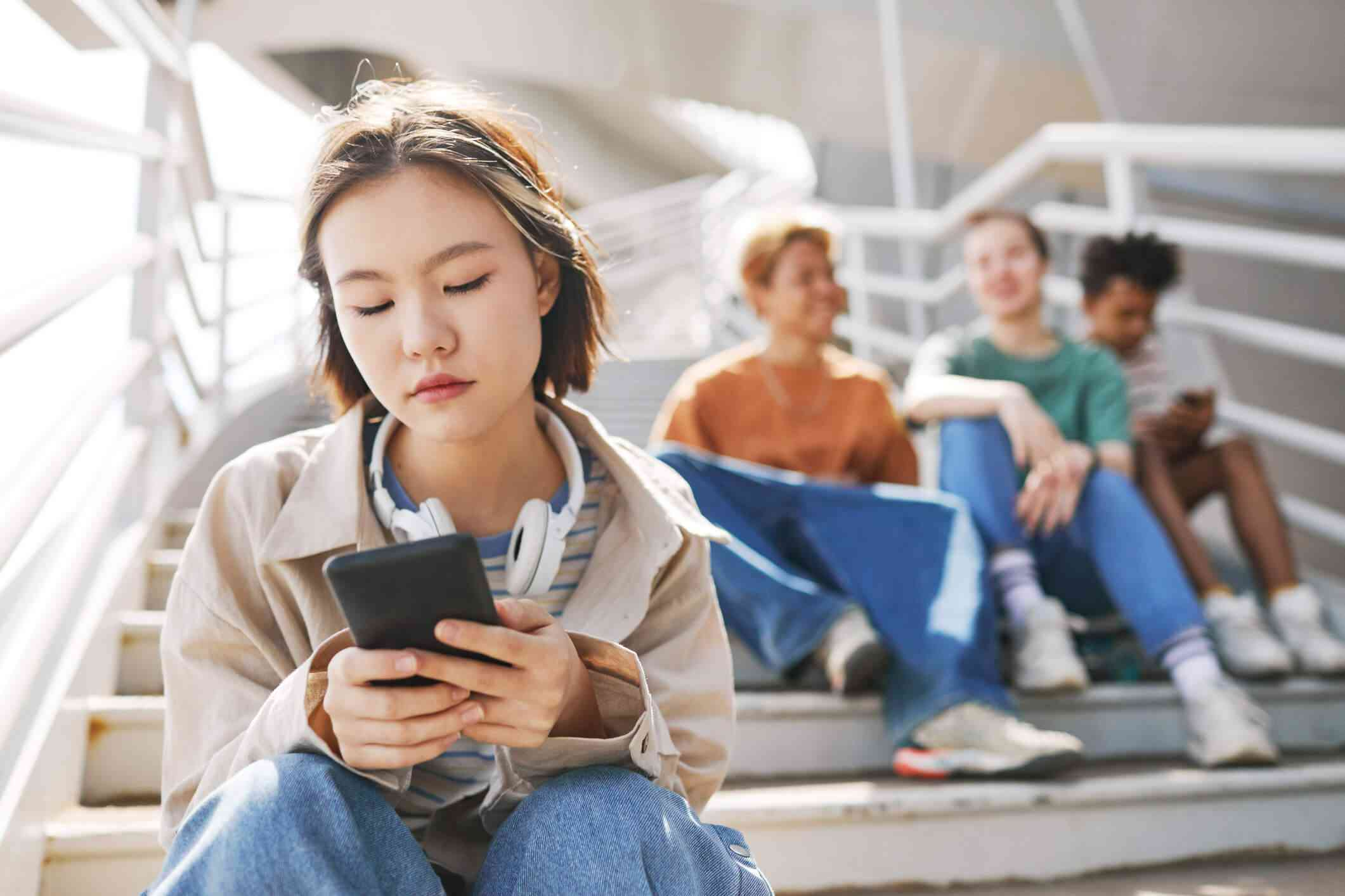 person using phone - Uninvolved Parenting