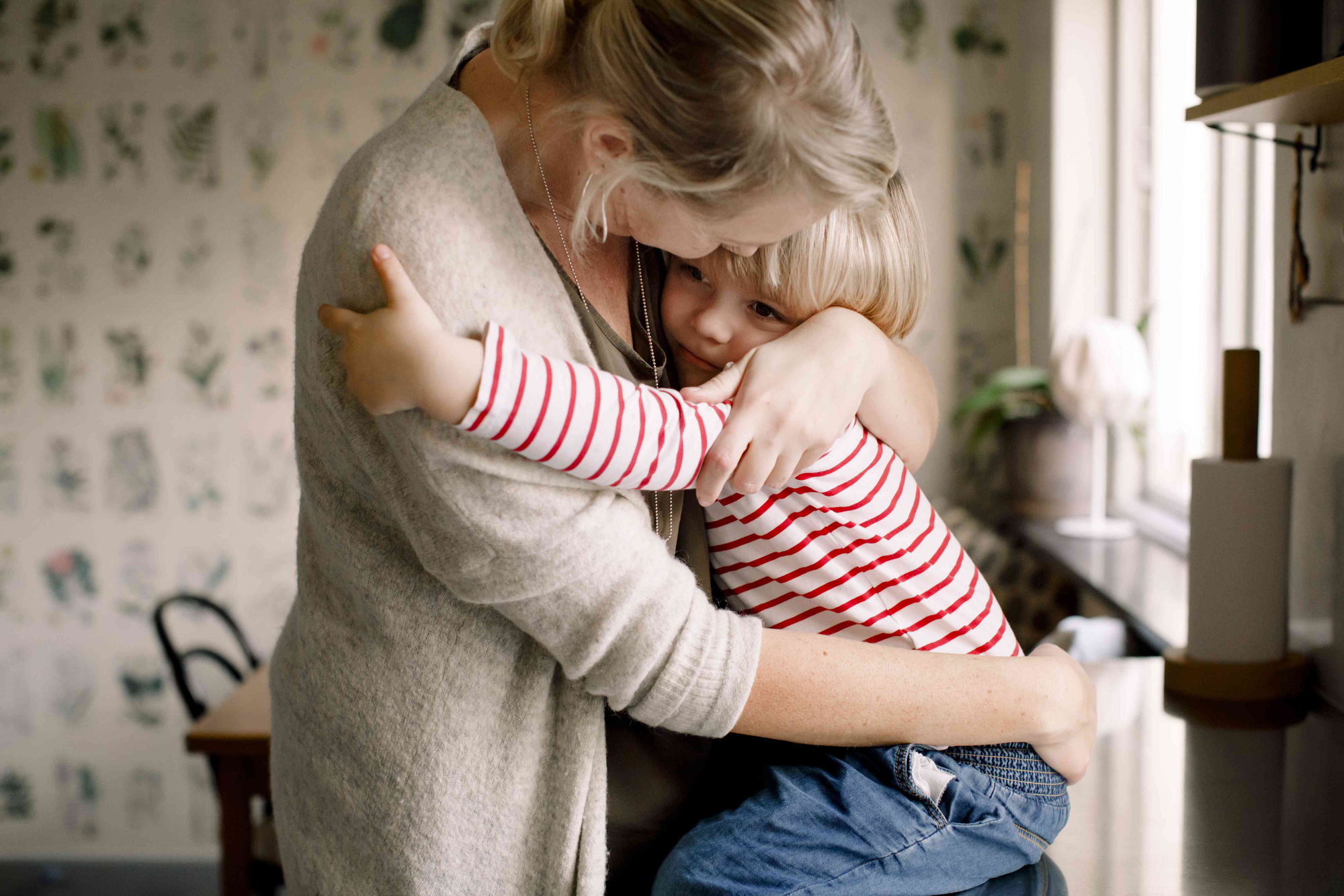Mother Hugging Child - Snowplow Parent