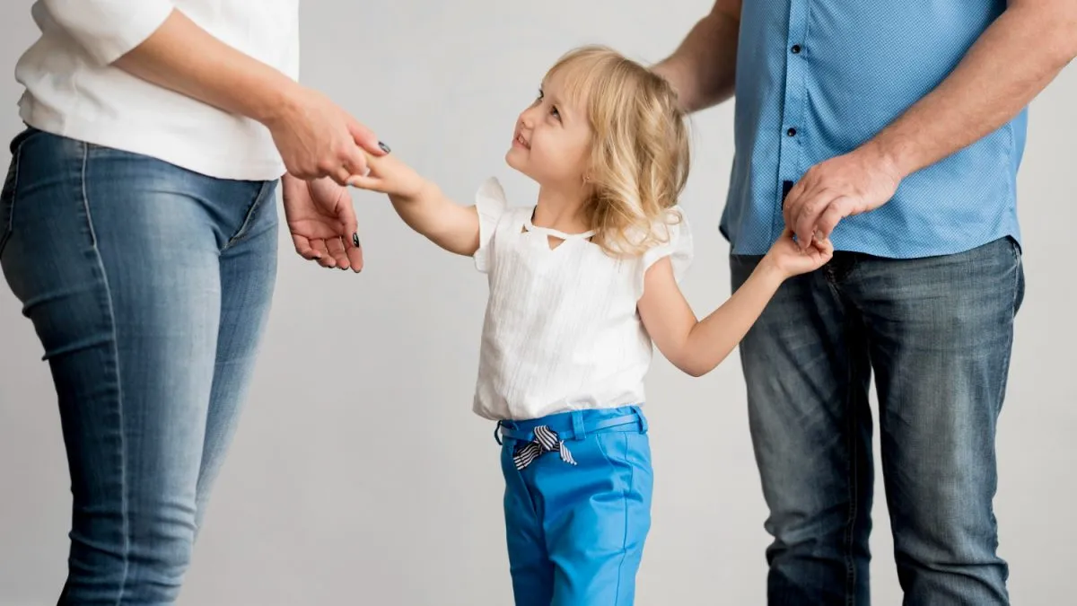 kid with parents - Parenting Therapy