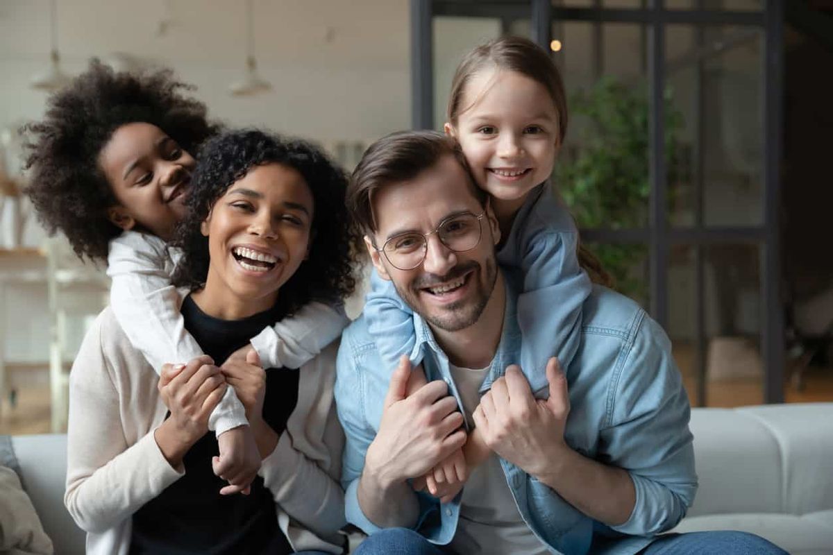 Parents Hugging with Childrn - Soft Parenting