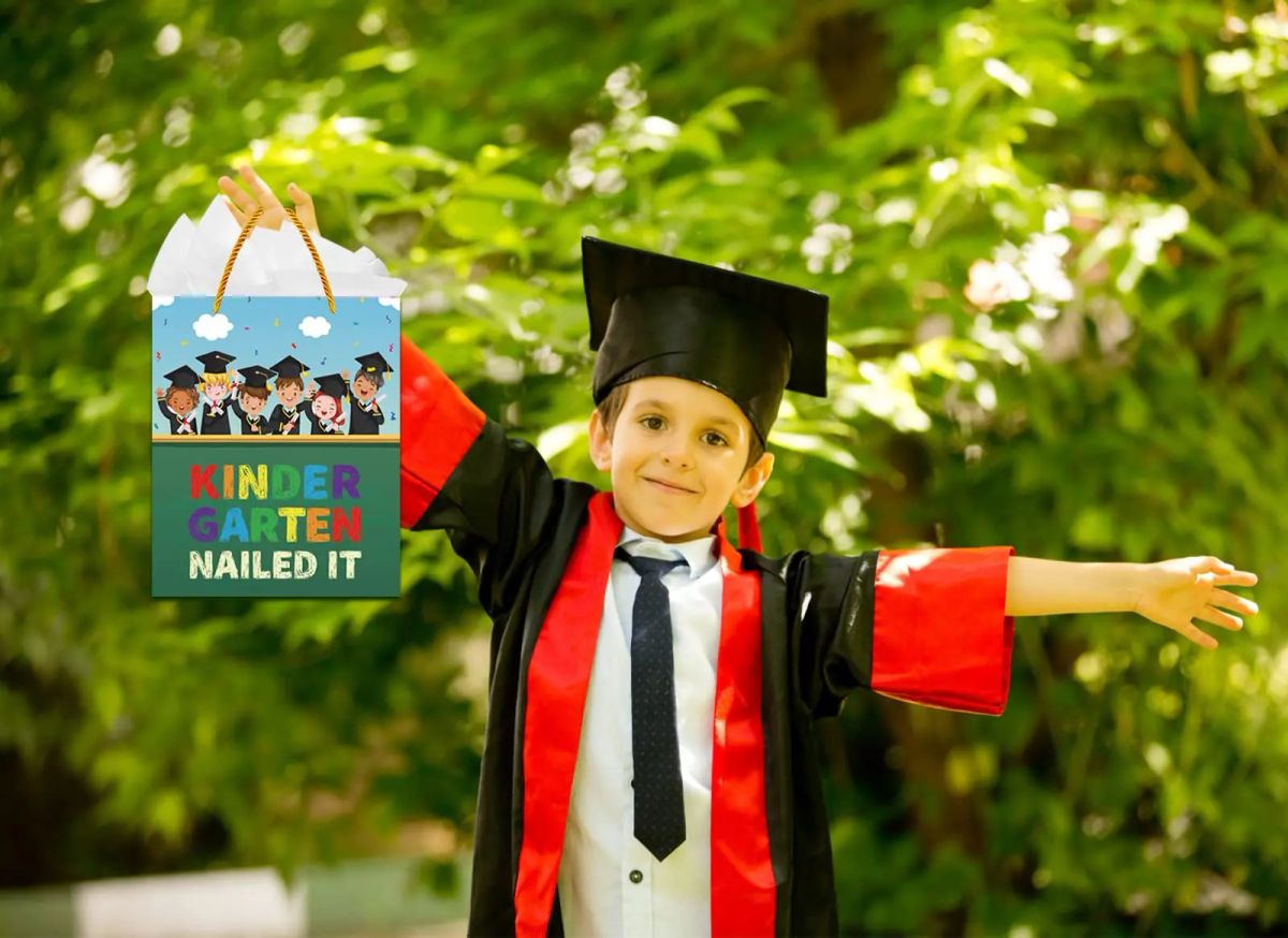 Kid with a gift - Preschool Graduation Gifts 