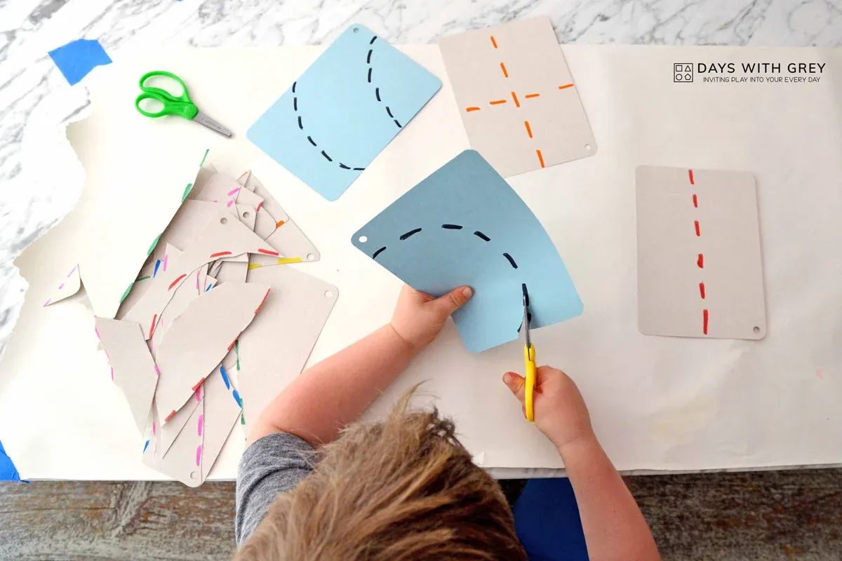 Student cutting - Cutting Practice Preschool 