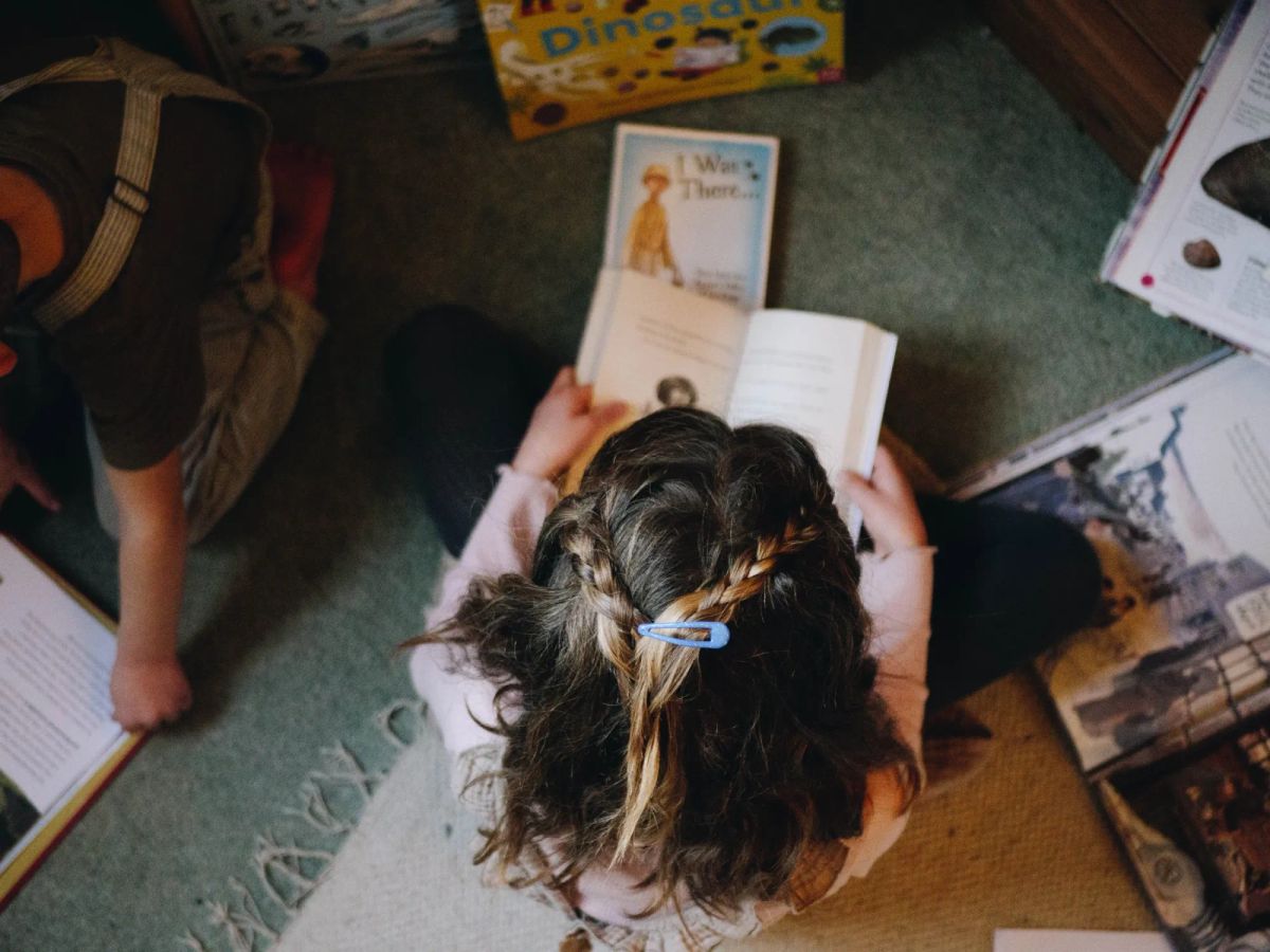 Kid with a book - Michigan Homeschool Laws 