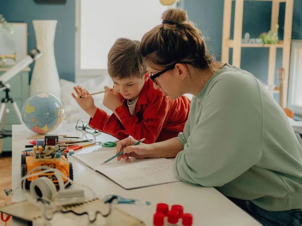 Mom Teaching Child - Homeschool History Curriculum