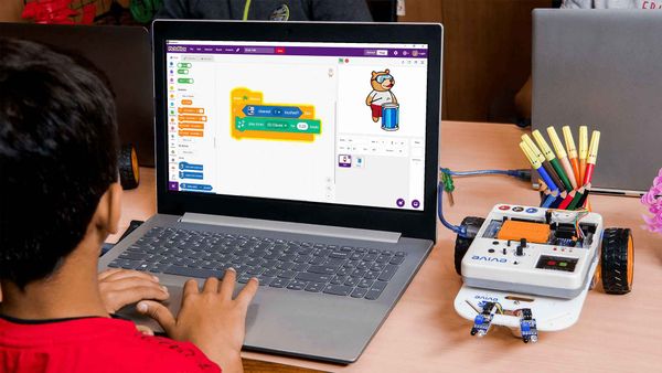 person using laptop - Best Coding Apps for Kids