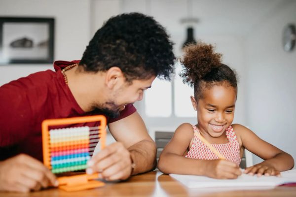 Helping kid with homework - Positive Parenting