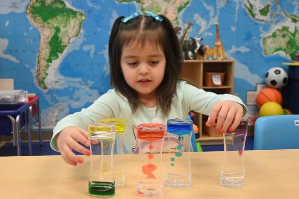 Kid doing experiment - Preschool Science Experiments 