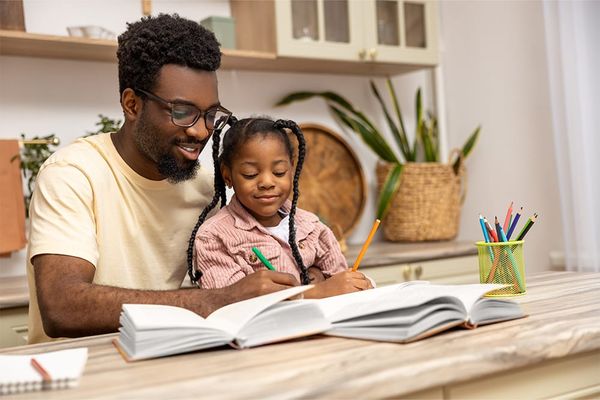 Father Teaching Kid - How to Homeschool in California