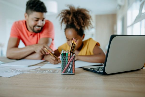 man helping his child - California Homeschool Laws
