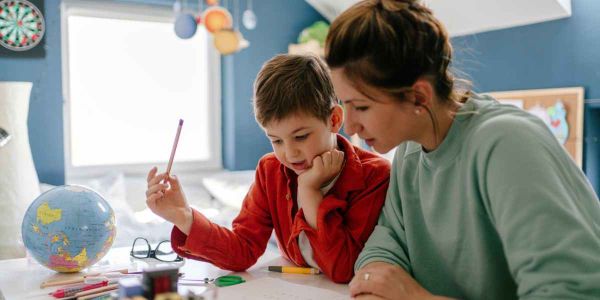 Woman Teaching Kid - Homeschool